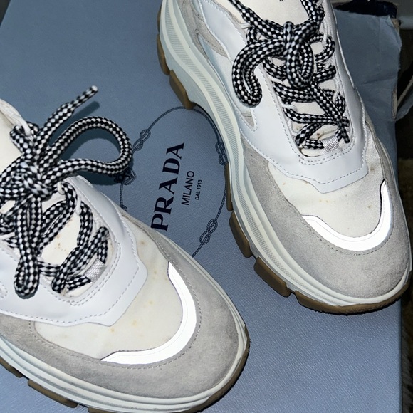 Prada sneakers It has a couple of little spots on it that’s cleanable. - Picture 10 of 12